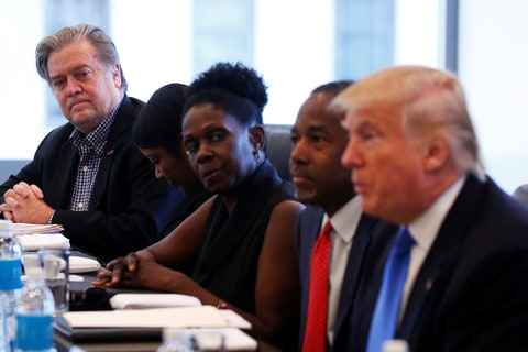Stephen Bannon (L) CEO of Republican presidential nominee Donald Trump's (R) campaign is pictured during a round table with the Republican Leadership Initiative at Trump Tower in the Manhattan borough of New York, U.S., August 25, 2016.