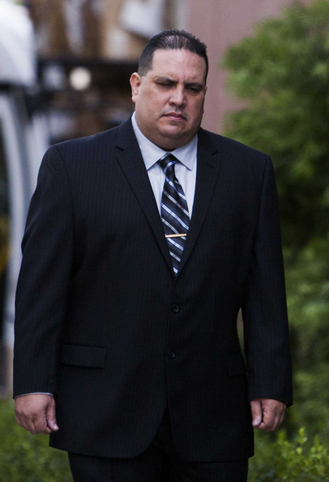 Navy Commander Jose Luis Sanchez arrives at the U.S. District Court in San Diego, California November 20, 2013. Commander Sanchez was arrested in Florida and charged with accepting prostitutes, luxury travel and $100,000 in cash