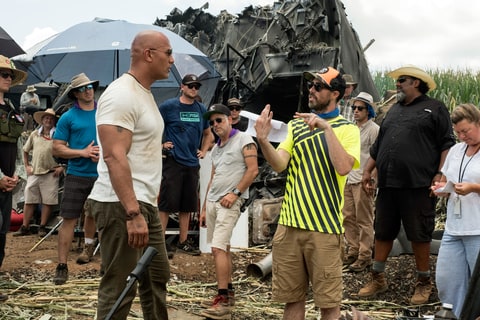 Johnson with director Brad Peyton on the set of