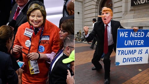 (left) A delegate deseed as Hillary Clinton in a prison jumpsuit walks the floor of the Quicken Loans Arena at the 2016 Republican National Convention in Cleveland, Ohio on Thursday July 201, 2016. (right) A man wearing a trump mask walks through downtown on July 17, 2016 in Cleveland, Ohio.