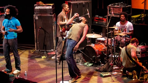 American band TV on the Radio perform onstage at 'Winter Soul' at the Brooklyn Academy of Music's Howard Gilman Opera House, Brooklyn, New York, New York, January 7, 2005. Pictured are, from left, Kyp Malone, Gerard Smith on electric bass guitar, vocalist Tunde Adebimpe, Jaleel Bunton on drums, and David Andrew Sitek on guitar. (Photo by Jack Vartoogian/Getty Images)
