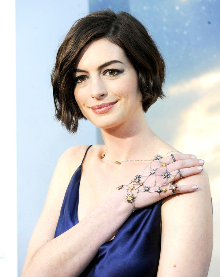 Anne Hathaway Rocked Starry Hand Jewels for Interstellar ... Anne Hathaway