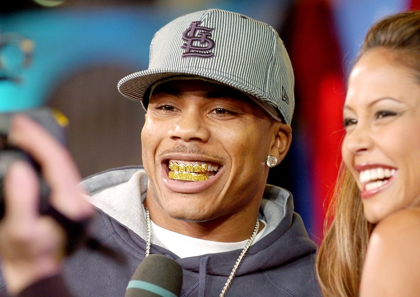 Nelly Celebrities Wearing Grillz The Most BlingedOut Smiles in Hollywood Us Weekly