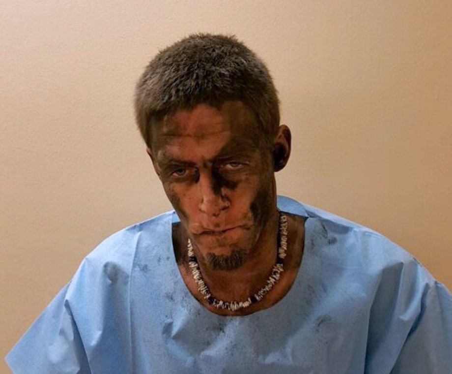 Alleged Bandit Gets Stuck In Chimney