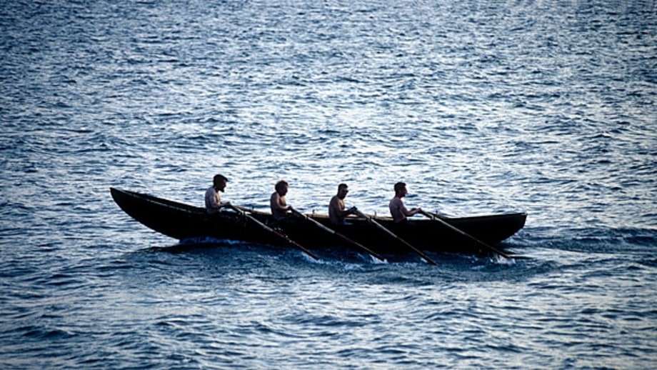 Currach through Cork City.