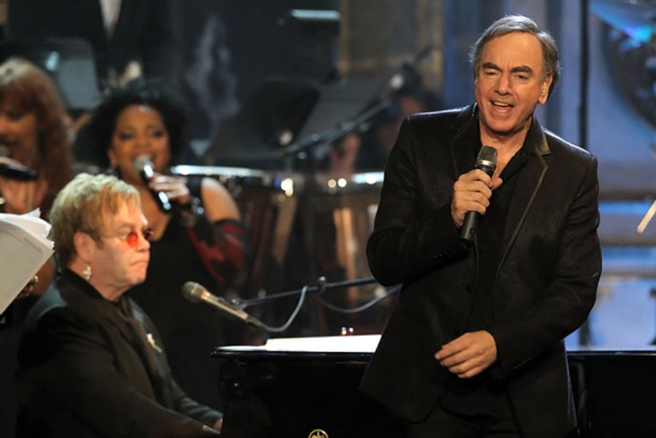 With Elton John