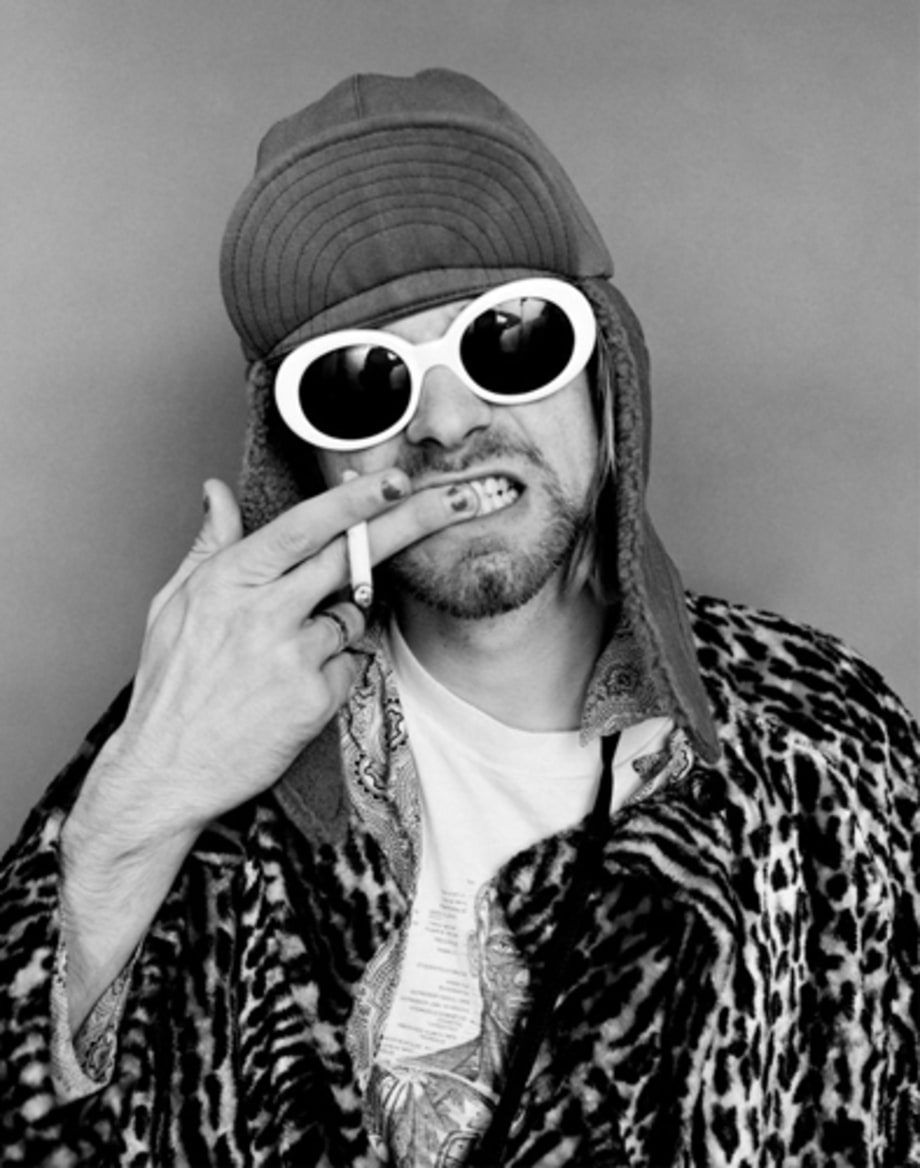 Hiding Behind His Shades