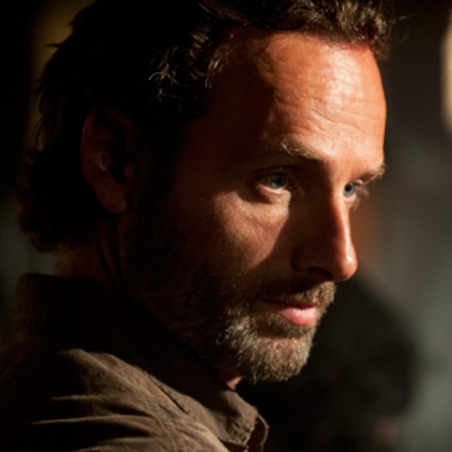 Rick takes a machete to Tomas' head