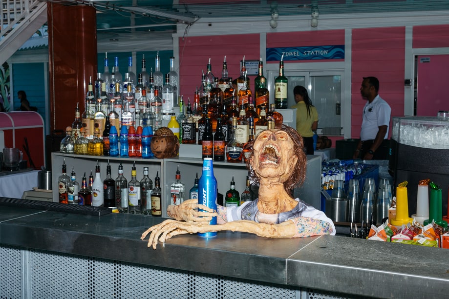 Zombie Grabs a Drink at the Bar