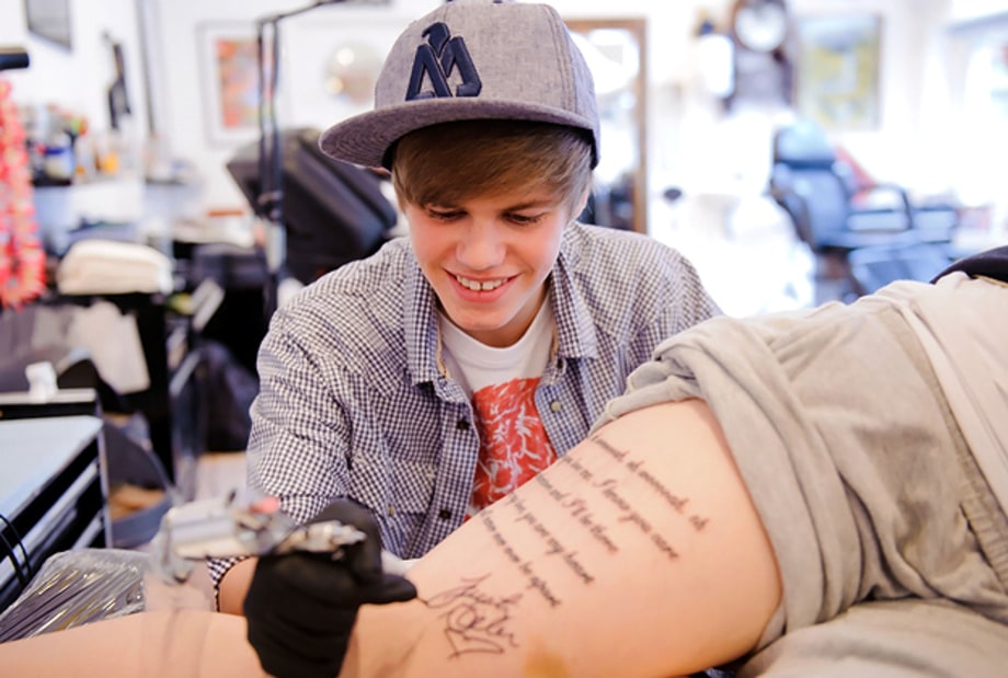 Fans' Bad and Bad-Ass Rock Tattoos