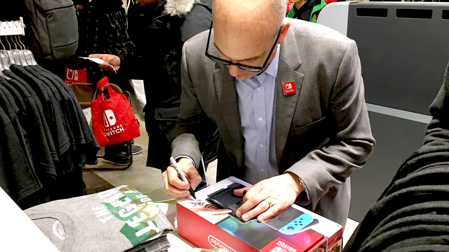 Nintendo executives – including the appropriately-named Doug Bowser – were on hand to sign the first batch of Switches