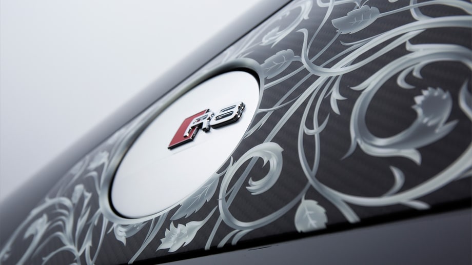 It has ornate patterns on the side intakes, around the filler cap and on the wing mirrors