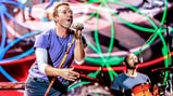 Watch Coldplay Fan in Wheelchair Perform With Band After Crowd-Surfing