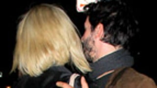 Charlize Theron, Keanu Reeves Kiss, Embrace