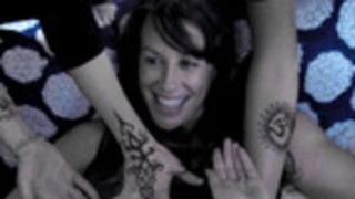 PIC: Pregnant Alanis Morissette Covers Belly in Henna Tattoos