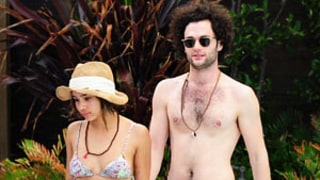 Bikini-Clad Zoe Kravitz Engages in Poolside PDA with Penn Badgley
