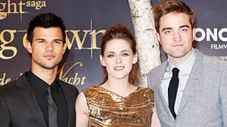 Kristen Stewart Flashes Major Leg in Sexy Golden Gown at Berlin Breaking Dawn Screening