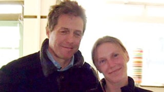 Awkward Picture! Hugh Grant Poses With Woman Breastfeeding Her Baby