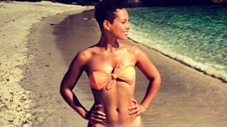 Alicia Keys Channels Halle Berry's Bond Girl in Orange Bikini: Picture