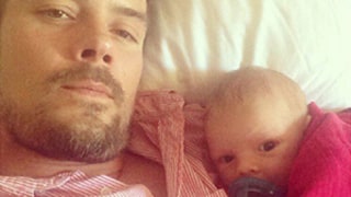 Josh Duhamel Cuddles Up to Baby Boy Axl to Watch Football: Picture