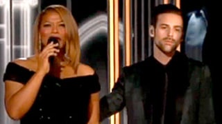 Queen Latifah Pulled Aside By Ryan Lewis for Madonna's Grammys Entrance