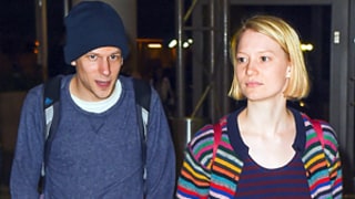 Jesse Eisenberg, Girlfriend Mia Wasikowska Hold Hands, Kiss at LAX: Photos