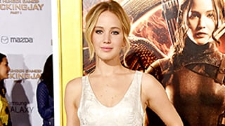 Jennifer Lawrence Has a Cinderella Moment in Voluminous Silver Gown, Plus More Stars at The Hunger Games Premiere