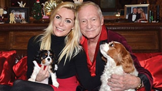 Hugh Hefner, Crystal Harris Snuggle Up to Their Dogs on Adorable 2014 Holiday Card
