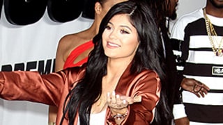 Kylie Jenner Dares to Bare in White Minidress, Fishnet Boots at Furious 7 Premiere: See Her Sexy Red Carpet Style!