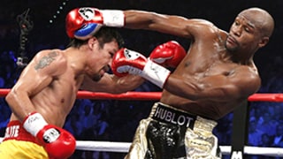 Floyd Mayweather Defeats Manny Pacquiao in Ring: Star Photos