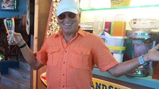 Jurassic World Secrets: Jimmy Buffett Is the Man Double Fisting Margaritas During Pterodactyl Attack