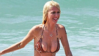 Tara Reid Romps on the Beach in Teeny-Tiny Nude Bikini: Swimsuit Pics