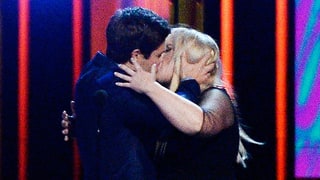 Pitch Perfect 2’s Rebel Wilson and Adam DeVine Make Out After Winning the MTV Movie Award for Best Kiss