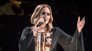 Adele Burps in Fan’s Face, Blames It on a ‘Dirty Burger’ at Glastonbury Performance