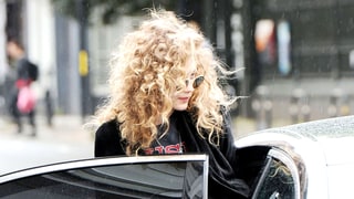Gigi Hadid Looks Unrecognizable With Wild ’80s Curls