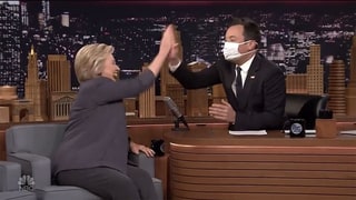 Jimmy Fallon Mocks Hillary Clinton’s Recent Health Scare by Wearing a Surgical Mask to Greet Her on ‘The Tonight Show’
