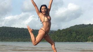 Eva Longoria Shows Off Extreme Muscles in Honeymoon Bikini Pic