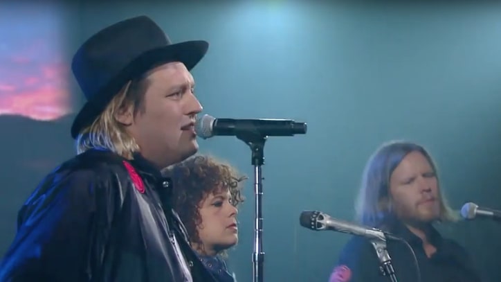 Watch Arcade Fire Perform Two Songs, Mock Consumerism on 'Colbert'