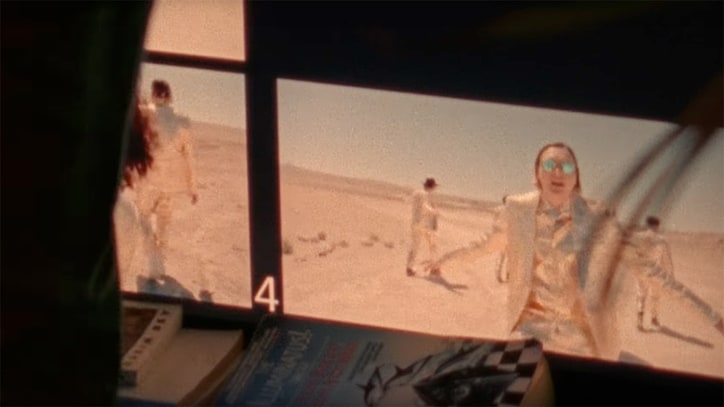 See Arcade Fire Search for Aliens in 'Signs of Life' Video