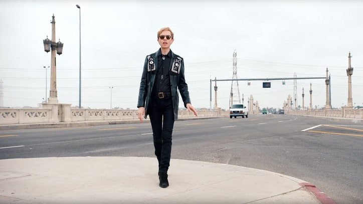 Watch Beck Dance in the Streets in Surreal 'Wow' Video