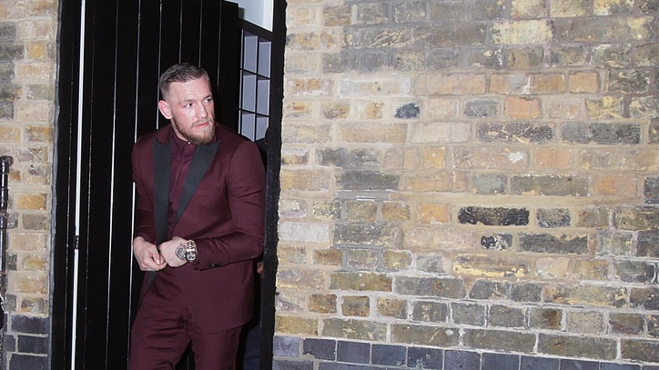 Conor McGregor Charged, Remains in Police Custody After Bus Attack
