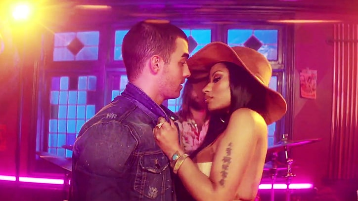 See DNCE, Nicki Minaj Play Spin the Bottle in 'Kissing Strangers' Video