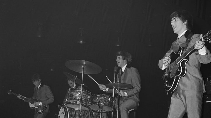 Unseen Beatles Photos From 1964 Sell for $358,000 at Auction