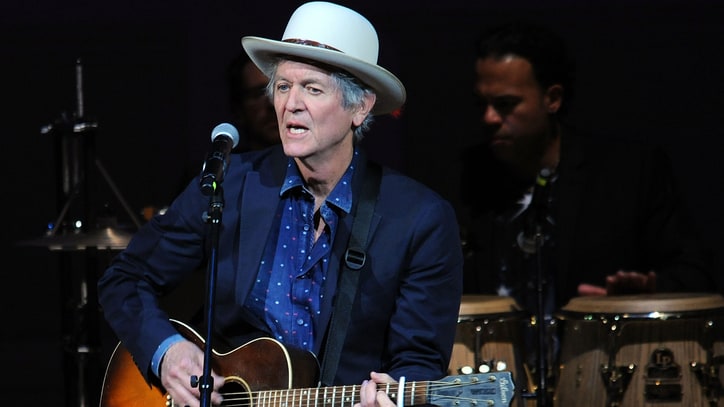 Watch Rodney Crowell Busk for Change in 'Nashville 1972' Video