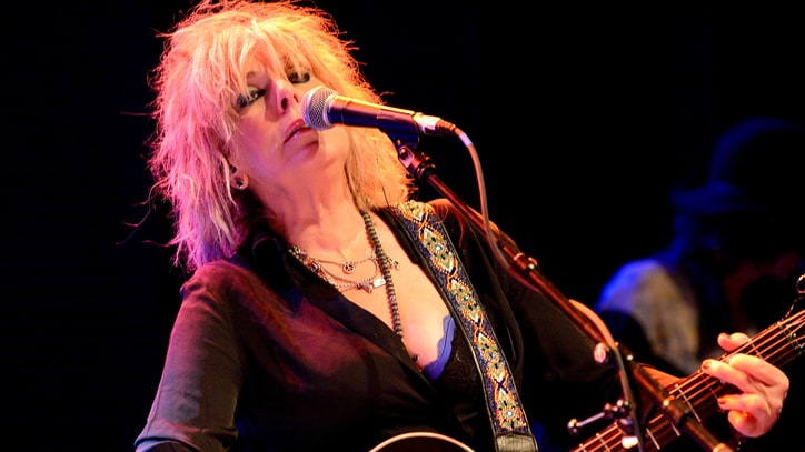 Hear Lucinda Williams' Mournful New Recording of 'Sidewalks of the City'