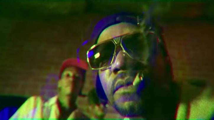 Watch Juicy J Hawk New Weed Strain in Psychedelic 'Green Suicide'