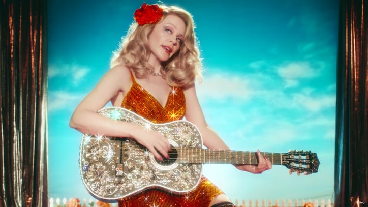 Watch Kylie Minogue Channel Dolly Parton in New 'Dancing' Video