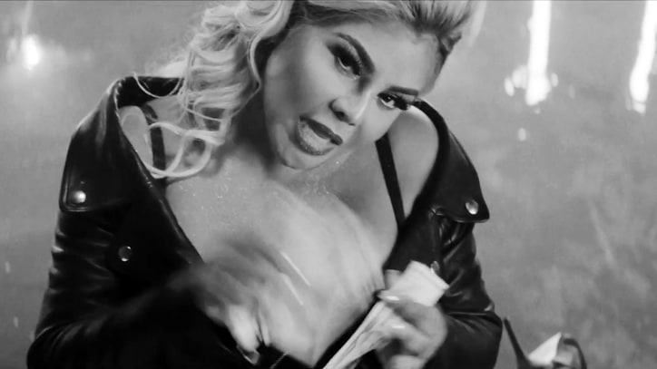 Watch Lil Kim's Eerie Video for New Song 'Took Us a Break'