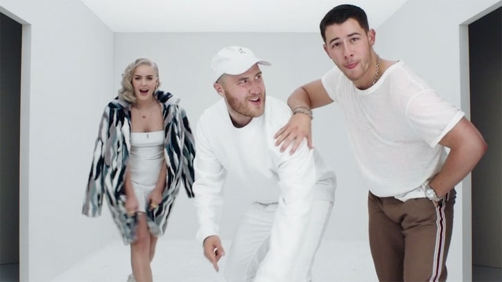 Watch Nick Jonas, Mike Posner's Playful 'Remember I Told You' Video