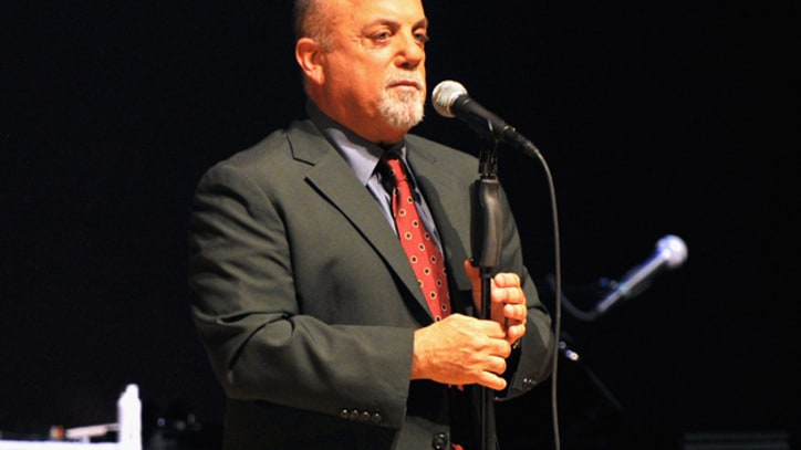 Billy Joel Surprises With Two Songs at High School Graduation